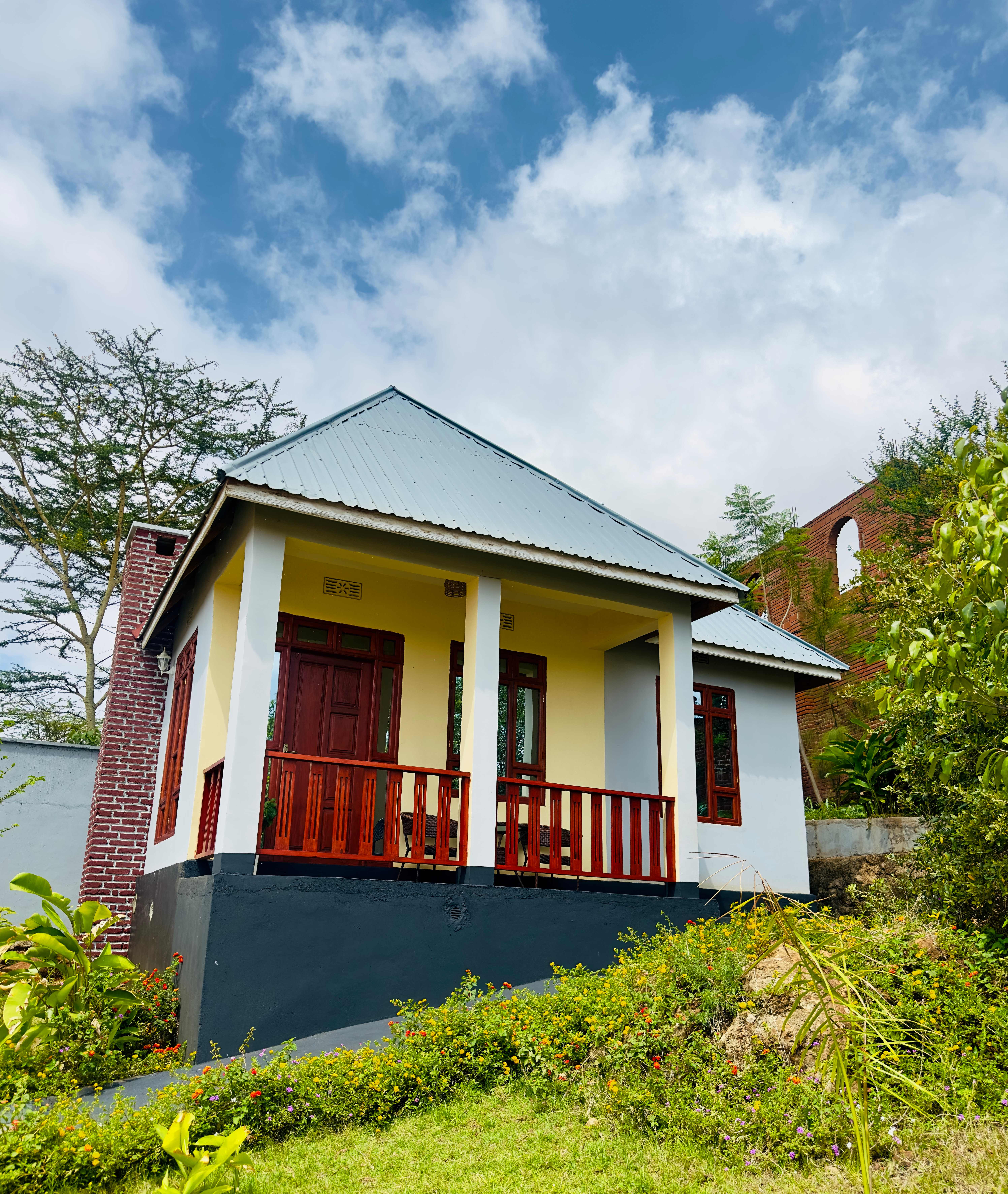 Helen's Home Lodge surrounded by lush gardens
